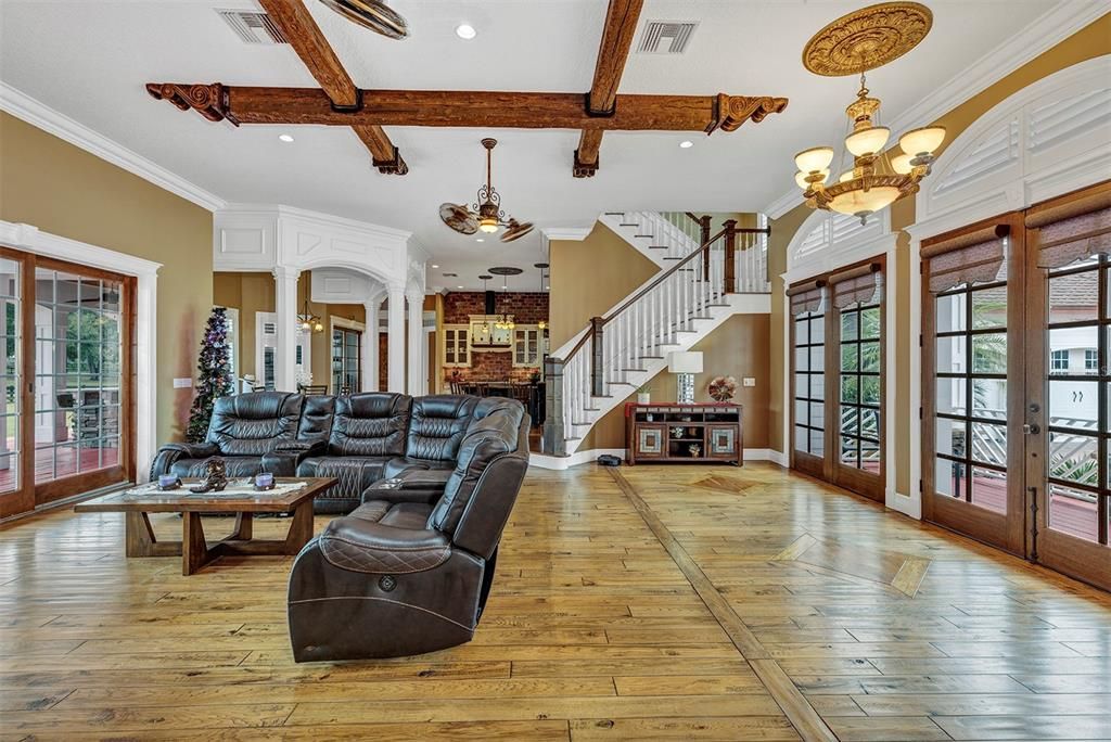 Chandelier, Interior, Living room, Recessed Lighting, Wooden Beams, Wood Texture Flooring