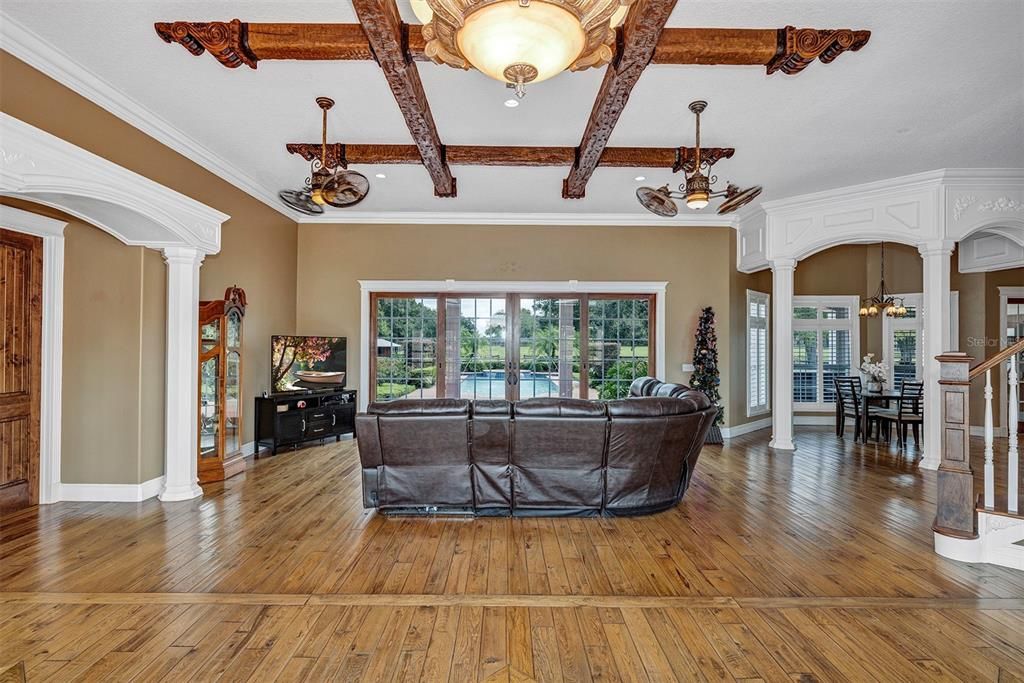 Chandelier, Dining room, Interior, Living room, Recessed Lighting, Wooden Beams, Wood Texture Flooring