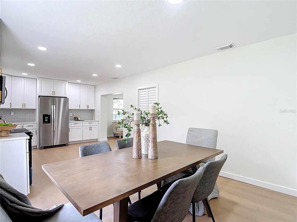 Dining room, Interior, Kitchen, Recessed Lighting, Stainless Steel Appliances, Wood Texture Flooring