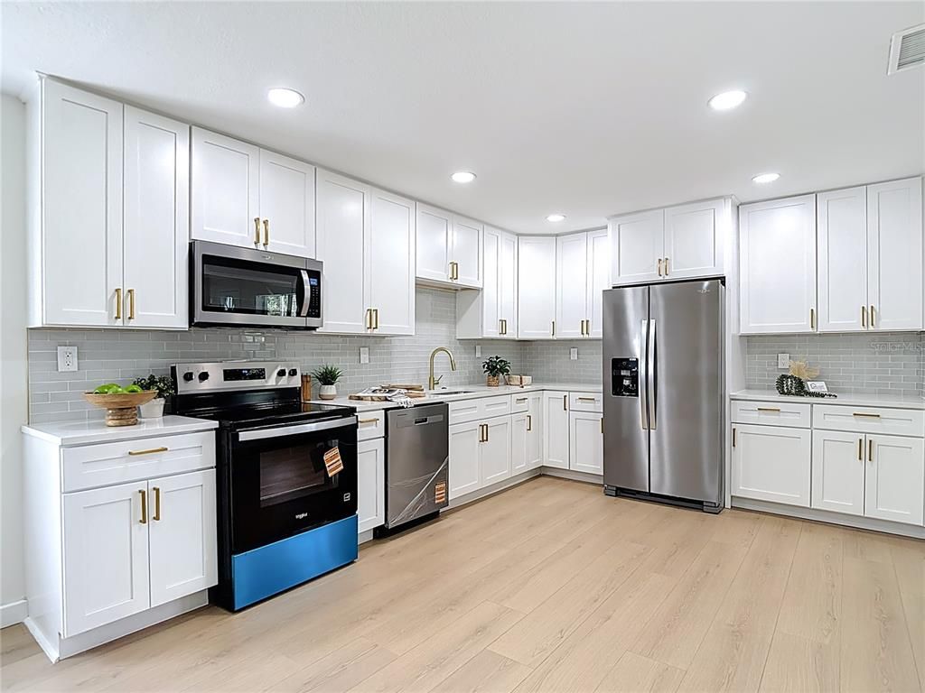 Interior, Kitchen, Recessed Lighting, Stainless Steel Appliances, Wood Texture Flooring