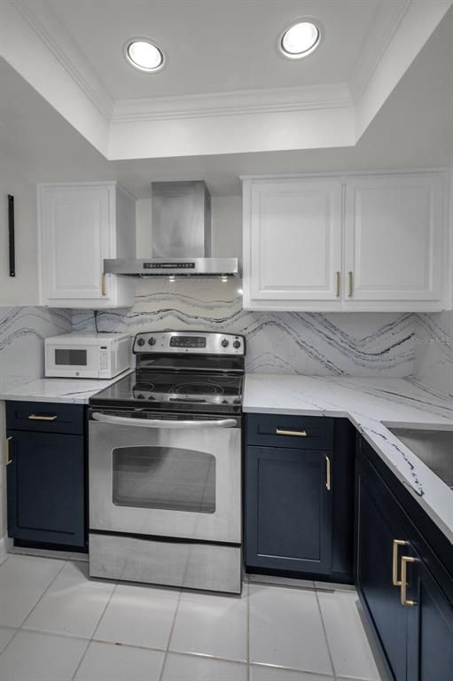 Interior, Kitchen, Marble Walls, Recessed Lighting, Stainless Steel Appliances