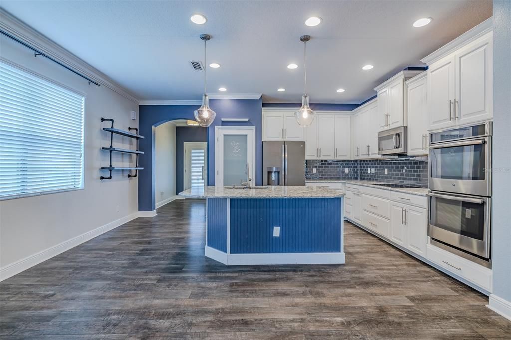 Interior, Kitchen, Pendant Lights, Recessed Lighting, Stainless Steel Appliances, Wood Texture Flooring