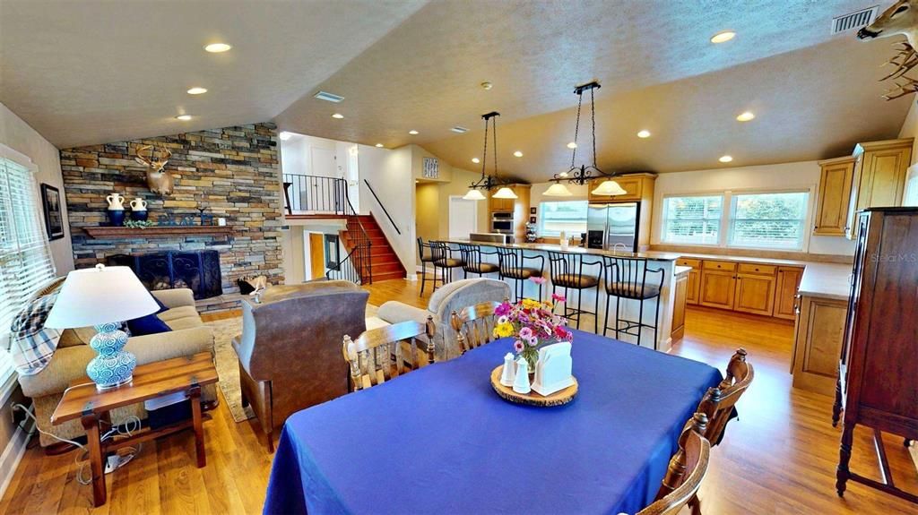Dining room, Fireplace, Interior, Kitchen, Living room, Pendant Lights, Recessed Lighting, Stone Walls, Wood Texture Flooring