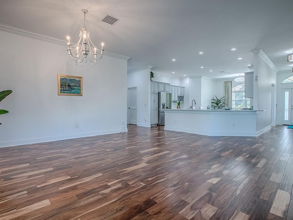 Chandelier, Empty room, Interior, Kitchen, Recessed Lighting, Wood Texture Flooring