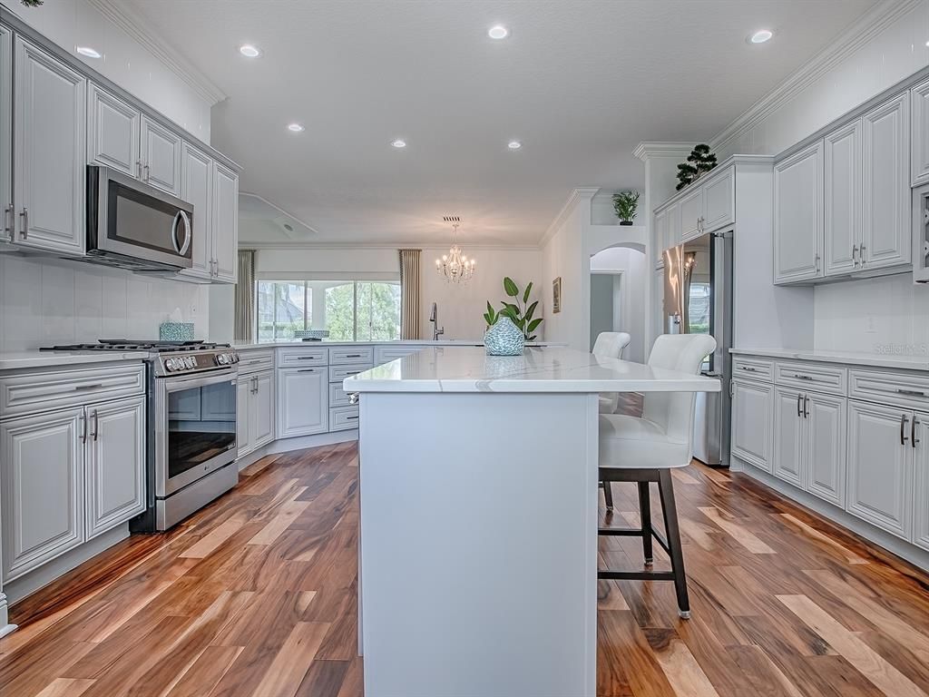 Chandelier, Interior, Kitchen, Recessed Lighting, Stainless Steel Appliances, Wood Texture Flooring