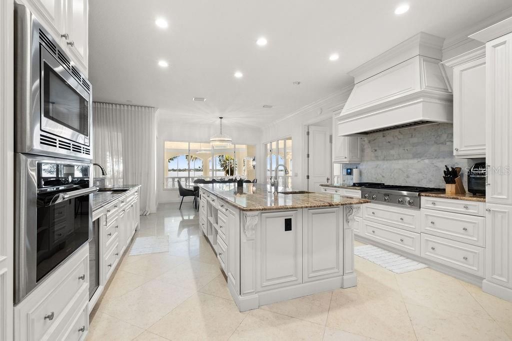 Chandelier, Dining room, Interior, Kitchen, Pendant Lights, Recessed Lighting, Stainless Steel Appliances