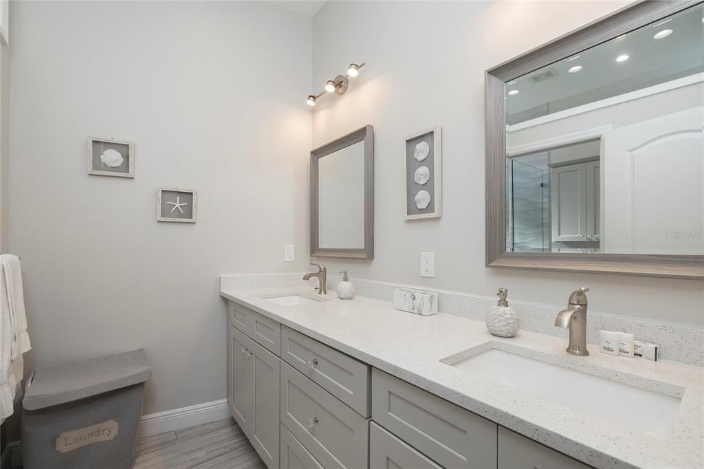 Bathroom, Dual Sink Vanities, Interior, Recessed Lighting, Wood Texture Flooring