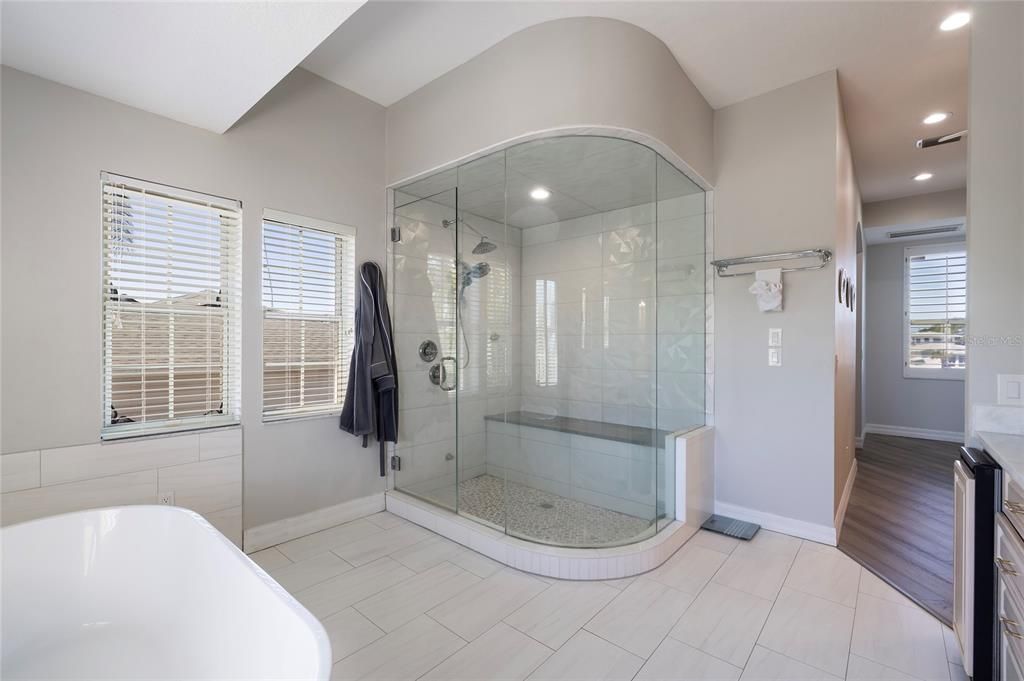 Bathroom, Free Standing Baths, Glass Shower, Interior, Recessed Lighting, Wood Texture Flooring