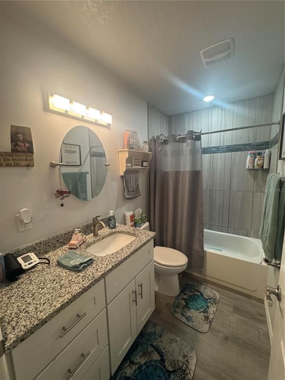 Bathroom, Dual Sink Vanities, Interior, Recessed Lighting, Wood Texture Flooring