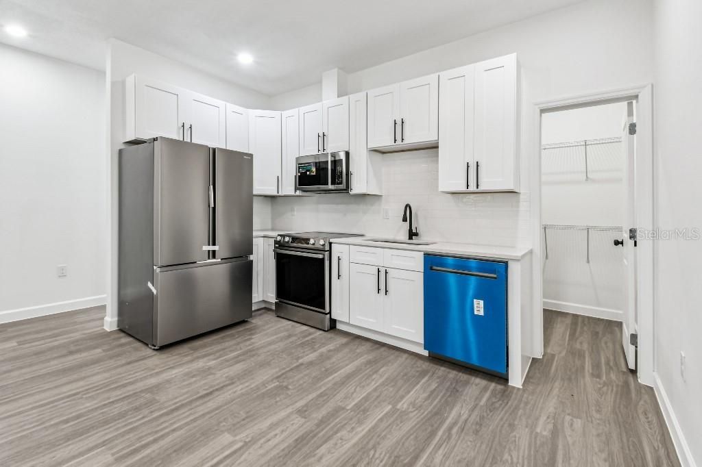 Interior, Kitchen, Recessed Lighting, Stainless Steel Appliances, Wood Texture Flooring