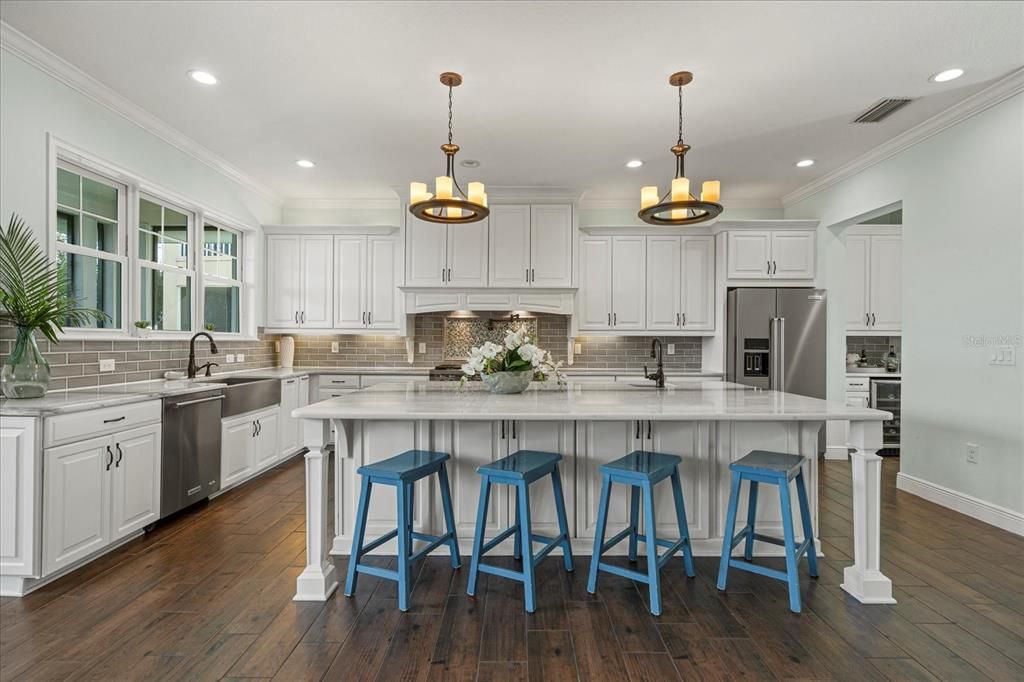 Chandelier, Interior, Kitchen, Pendant Lights, Recessed Lighting, Stainless Steel Appliances, Wood Texture Flooring