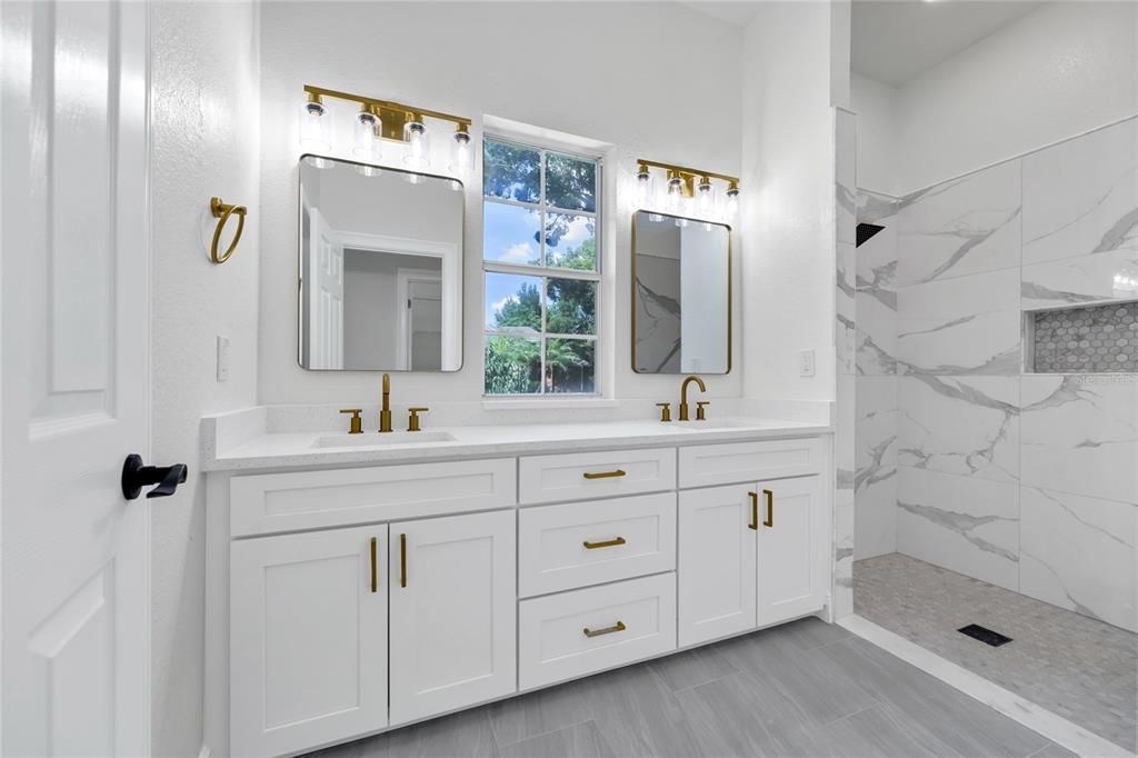 Bathroom, Dual Sink Vanities, Glass Shower, Interior, Marble Walls, Wood Texture Flooring