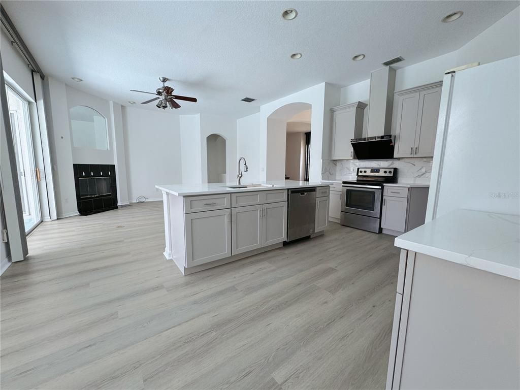Interior, Kitchen, Recessed Lighting, Stainless Steel Appliances, Wood Texture Flooring