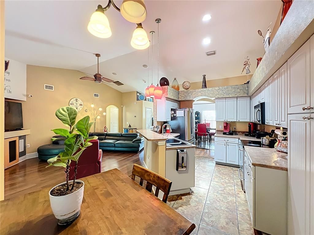 Dining room, Interior, Kitchen, Living room, Pendant Lights, Recessed Lighting, Wood Texture Flooring