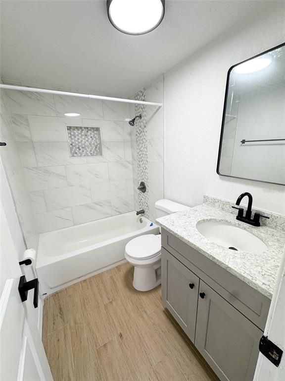 Bathroom, Dual Sink Vanities, Interior, Marble Walls, Wood Texture Flooring