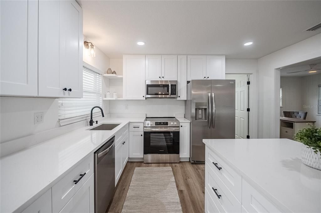 Interior, Kitchen, Recessed Lighting, Stainless Steel Appliances, Wood Texture Flooring