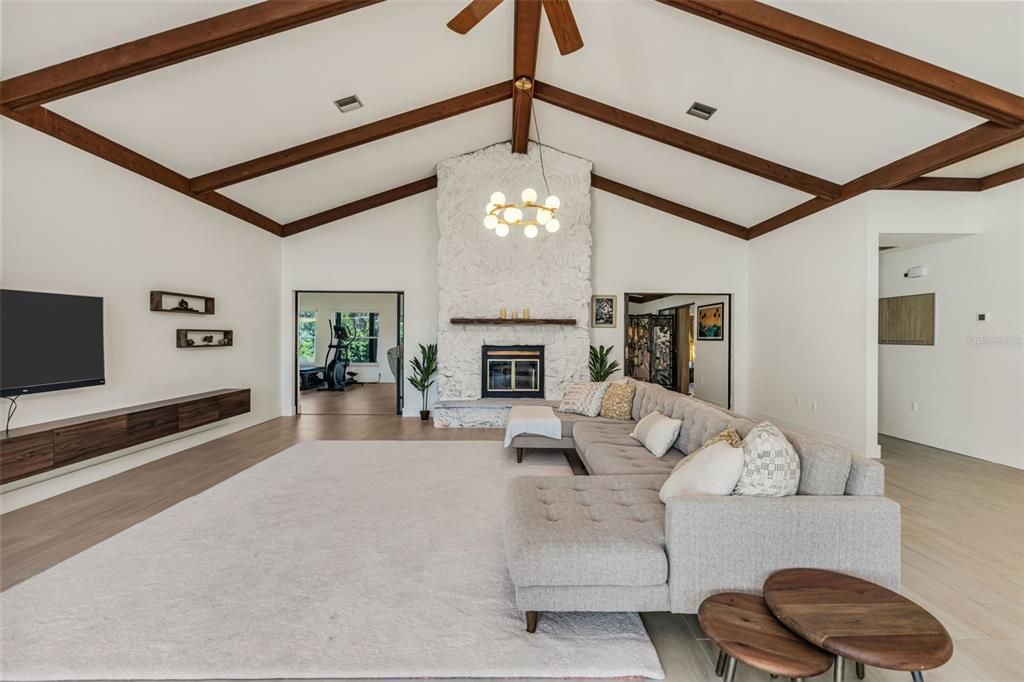 Chandelier, Fireplace, Interior, Living room, Wooden Beams, Wood Texture Flooring