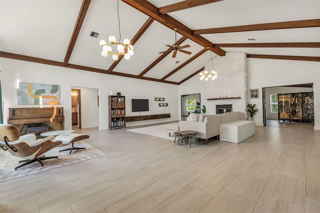 Chandelier, Fireplace, Interior, Living room, Pendant Lights, Wooden Beams, Wood Texture Flooring
