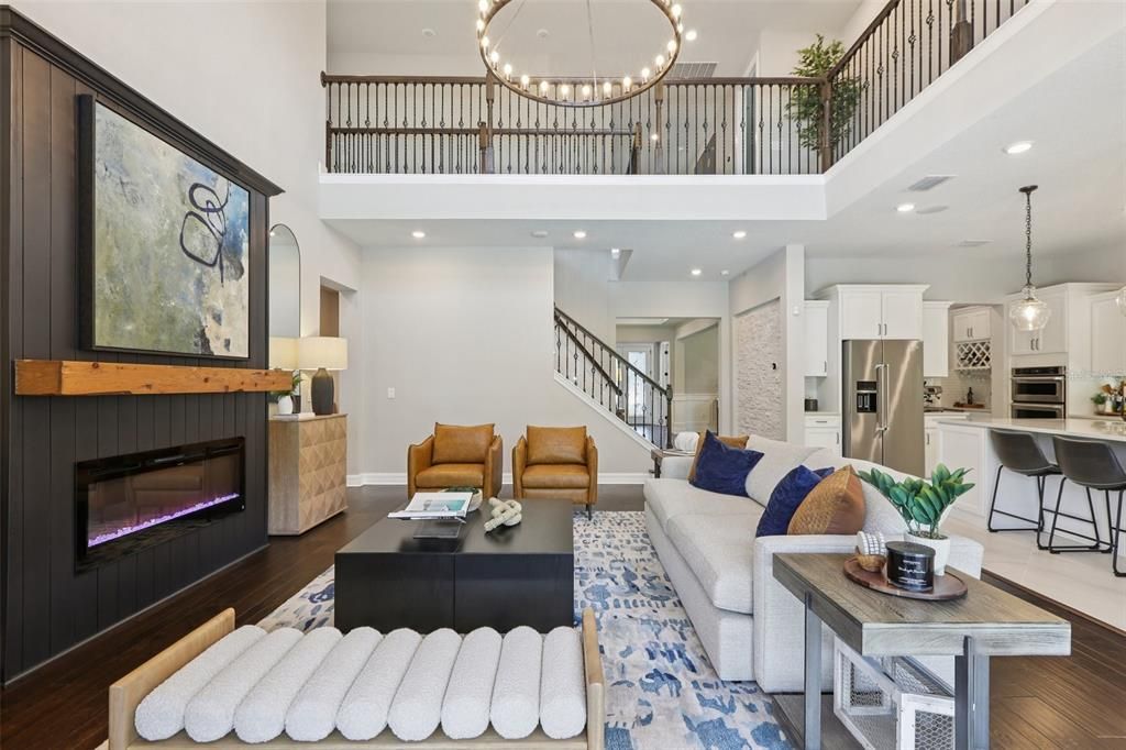 Fireplace, Interior, Kitchen, Living room, Pendant Lights, Recessed Lighting, Stainless Steel Appliances, Wood Texture Flooring