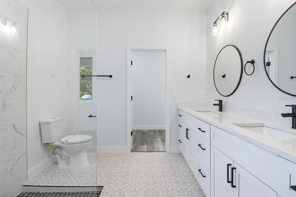 Bathroom, Dual Sink Vanities, Interior, Marble Walls, Wood Texture Flooring