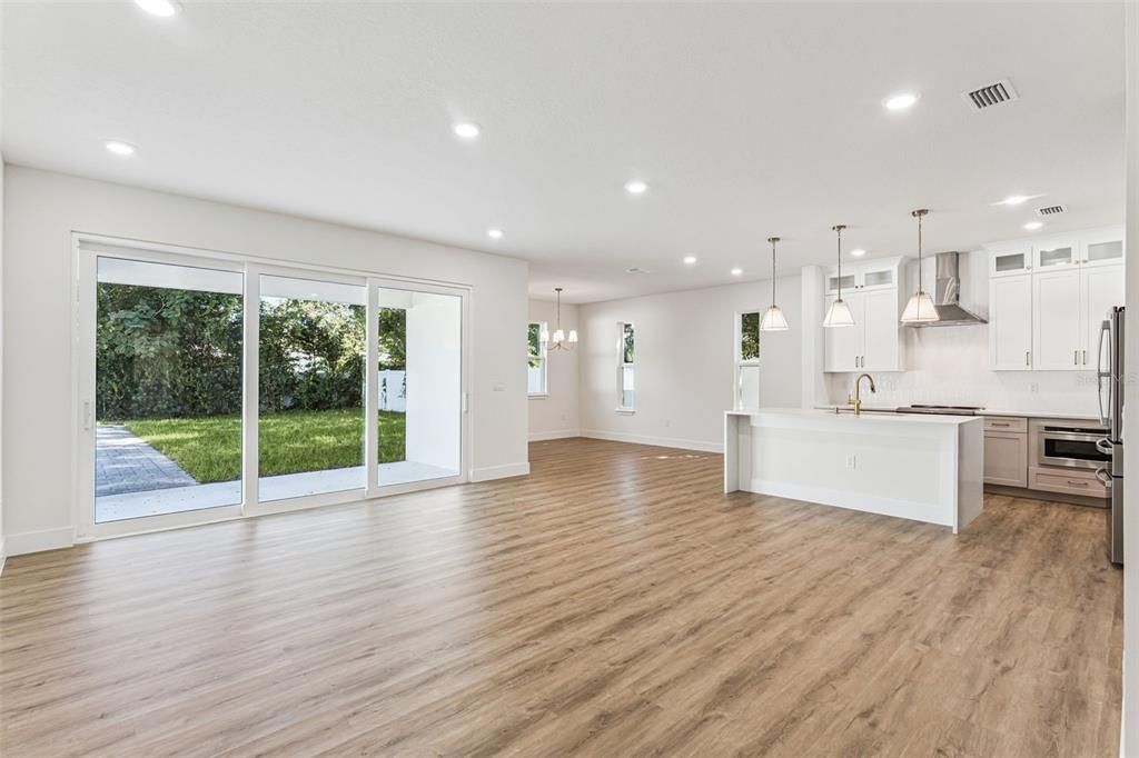 Empty room, Interior, Kitchen, Pendant Lights, Recessed Lighting, Wood Texture Flooring