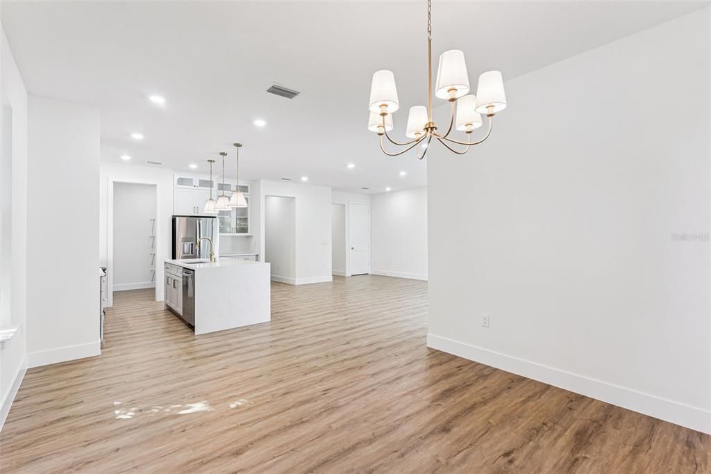Chandelier, Empty room, Interior, Kitchen, Pendant Lights, Recessed Lighting, Wood Texture Flooring