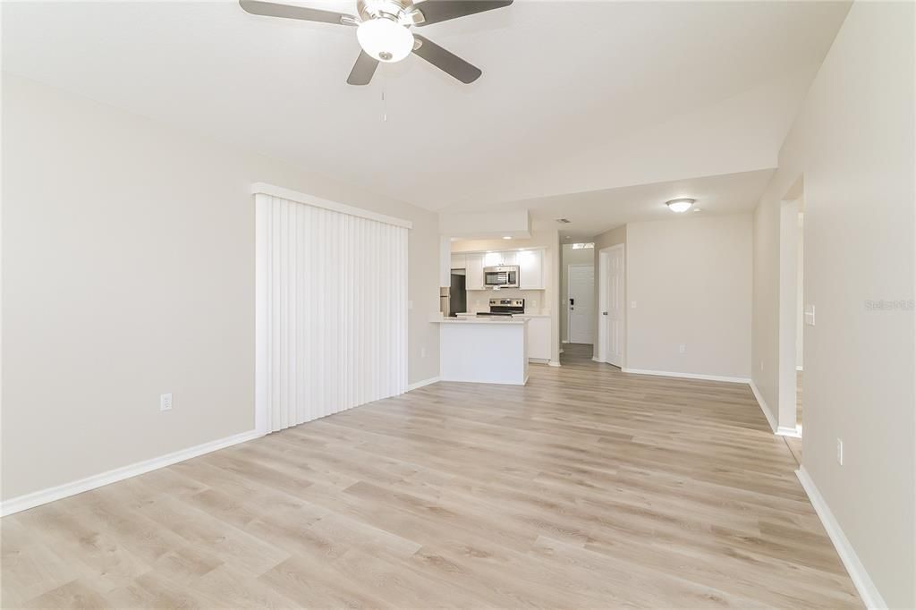 Empty room, Interior, Kitchen, Stainless Steel Appliances, Wood Texture Flooring