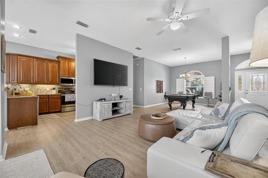 Billiard Table, Chandelier, Game Room, Interior, Kitchen, Living room, Recessed Lighting, Wood Texture Flooring