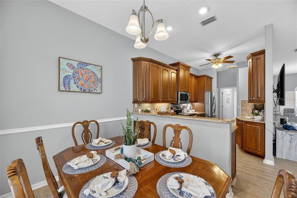 Dining room, Interior, Kitchen, Recessed Lighting, Stainless Steel Appliances, Wood Texture Flooring
