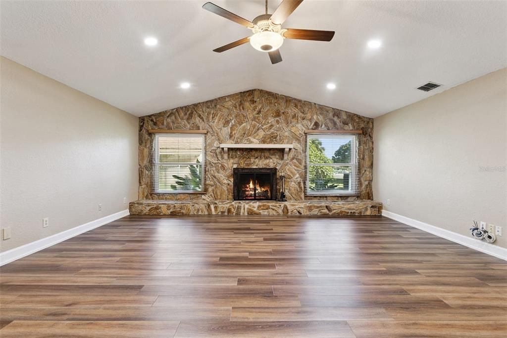 Empty room, Fireplace, Interior, Recessed Lighting, Wood Texture Flooring
