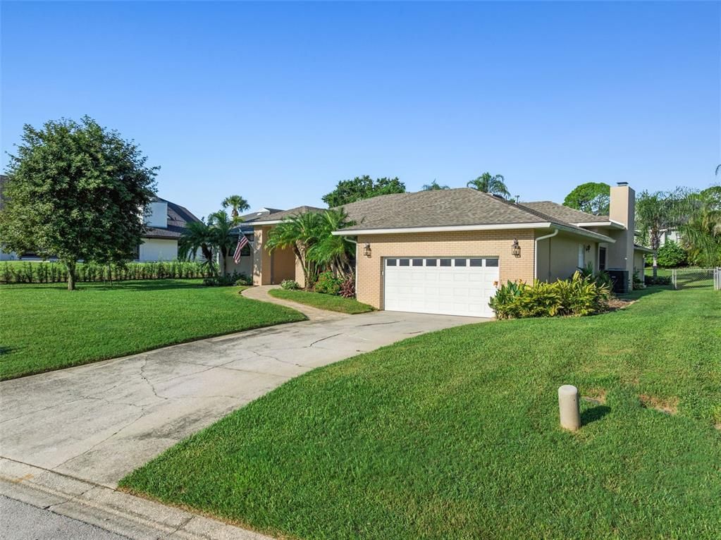 Attached, Backyard, Exterior, Facade, Brick Facade, Ranch