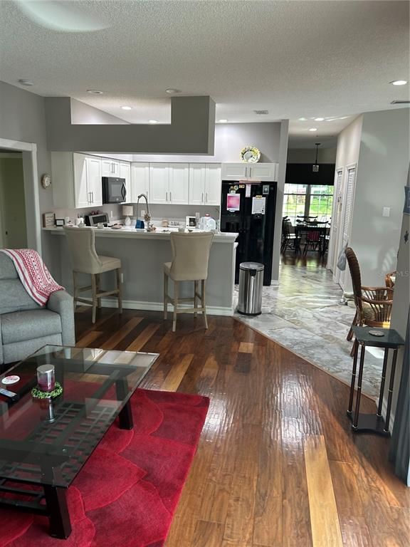 Dining room, Interior, Kitchen, Living room, Recessed Lighting, Wood Texture Flooring