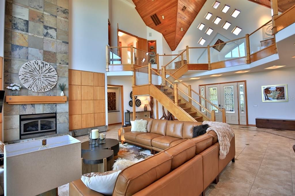 Fireplace, Interior, Living room, Recessed Lighting, Stone Walls, Wooden Ceilings