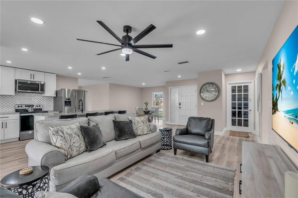 Dining room, Interior, Kitchen, Living room, Recessed Lighting, Stainless Steel Appliances, Wood Texture Flooring