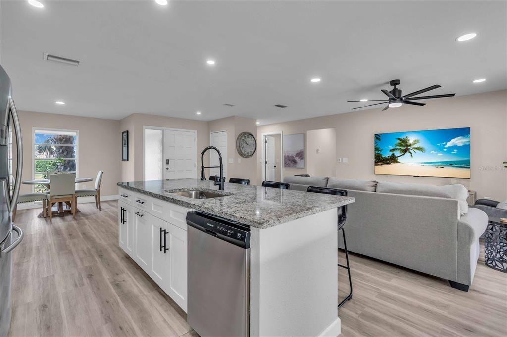 Dining room, Interior, Kitchen, Living room, Recessed Lighting, Wood Texture Flooring
