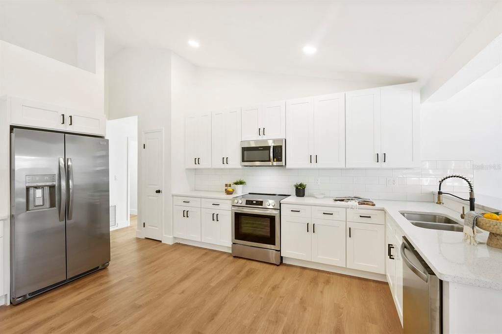Interior, Kitchen, Recessed Lighting, Stainless Steel Appliances, Wood Texture Flooring