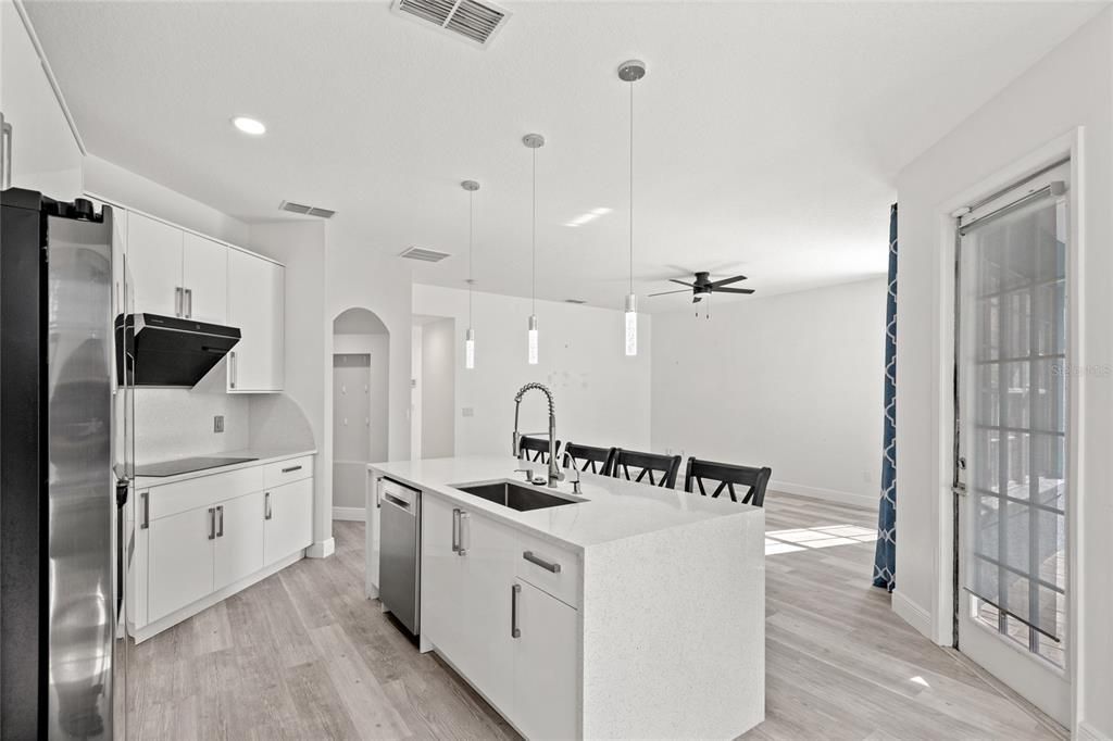 Interior, Kitchen, Pendant Lights, Recessed Lighting, Stainless Steel Appliances, Wood Texture Flooring