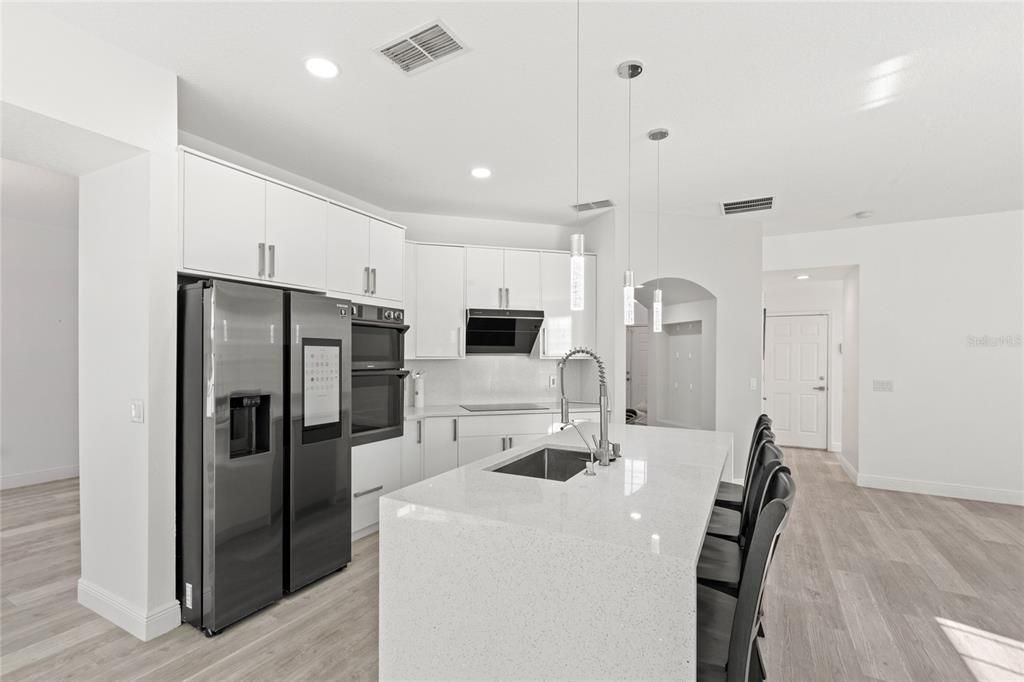 Interior, Kitchen, Pendant Lights, Recessed Lighting, Stainless Steel Appliances, Wood Texture Flooring