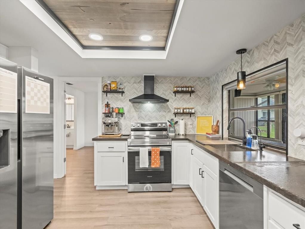 Interior, Kitchen, Pendant Lights, Recessed Lighting, Stainless Steel Appliances, Stone Walls, Wooden Ceilings, Wood Texture Flooring
