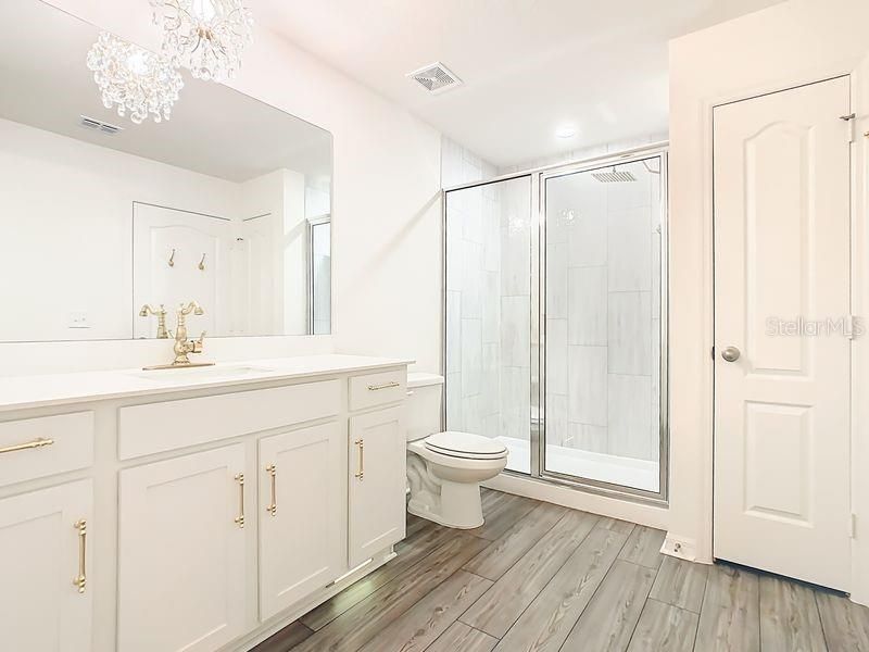 Bathroom, Glass Shower, Interior, Recessed Lighting, Wood Texture Flooring