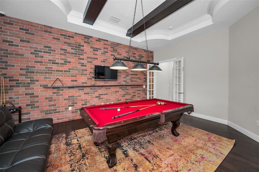 Billiard Table, Game Room, Interior, Pendant Lights, Stone Walls, Wood Texture Flooring