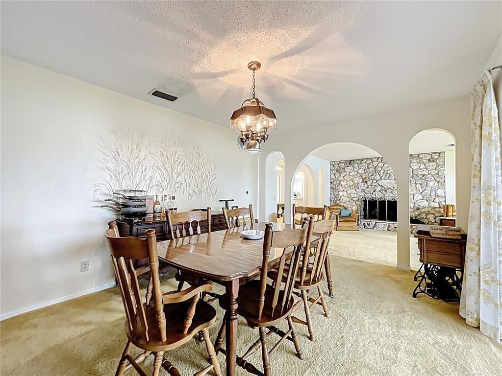 Dining room, Fireplace, Interior, Pendant Lights, Stone Walls