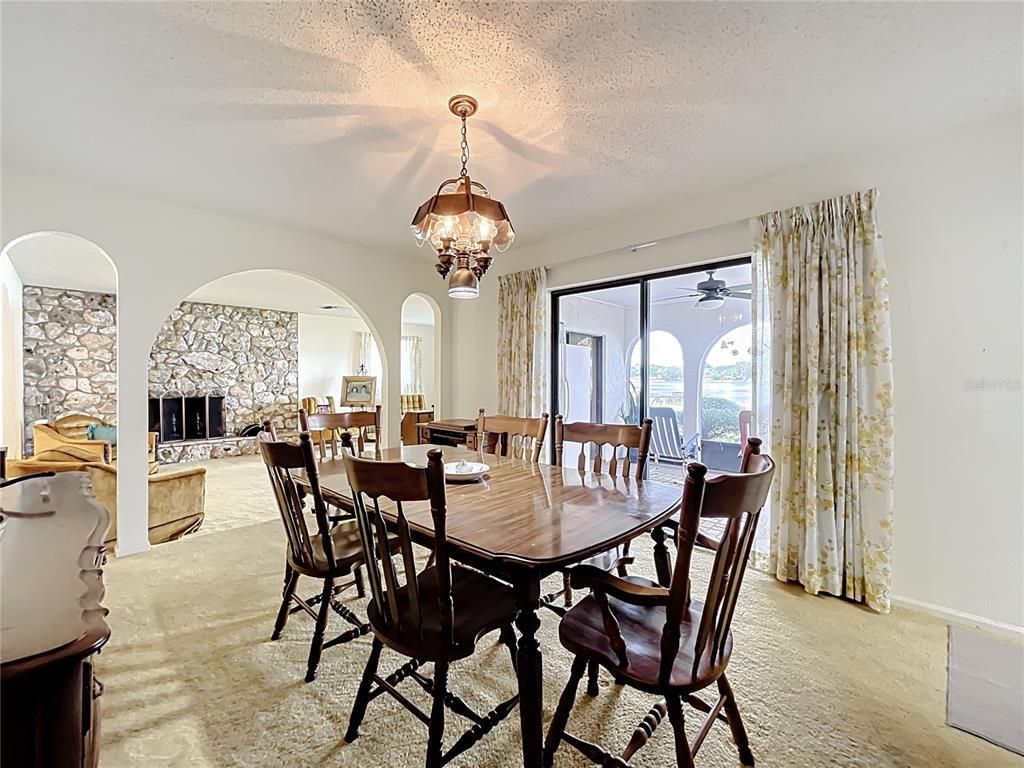 Chandelier, Dining room, Fireplace, Interior, Pendant Lights, Stone Walls