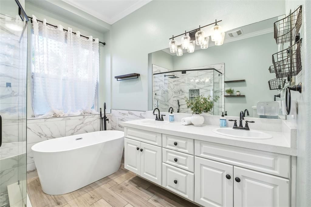 Bathroom, Dual Sink Vanities, Free Standing Baths, Glass Shower, Interior, Marble Walls, Wood Texture Flooring