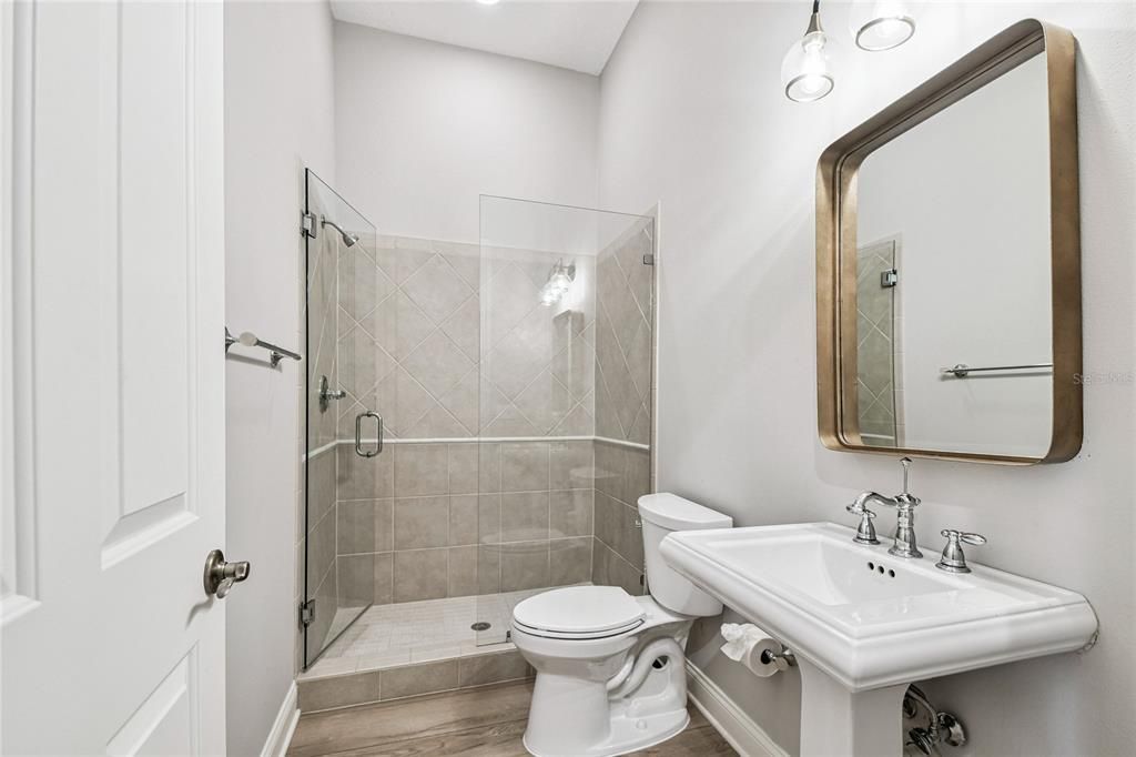 Bathroom, Glass Shower, Interior, Recessed Lighting, Wood Texture Flooring