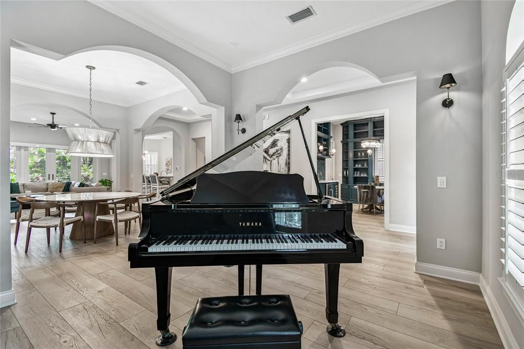 Dining room, Interior, Pendant Lights, Piano, Recessed Lighting, Wood Texture Flooring