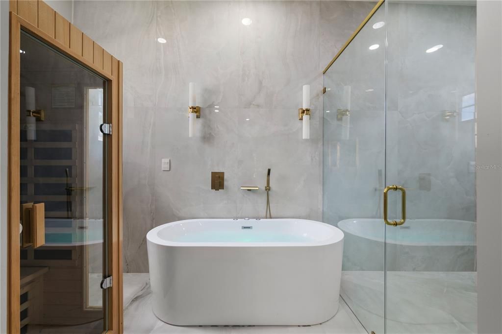 Bathroom, Free Standing Baths, Glass Shower, Interior, Marble Walls, Recessed Lighting