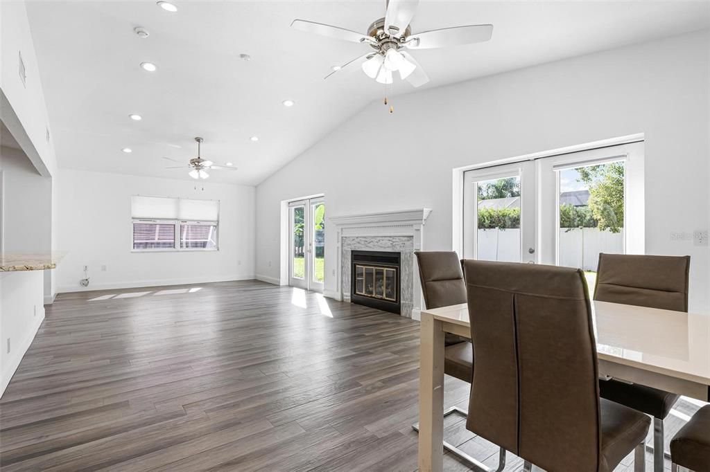 Dining room, Fireplace, Interior, Recessed Lighting, Wood Texture Flooring