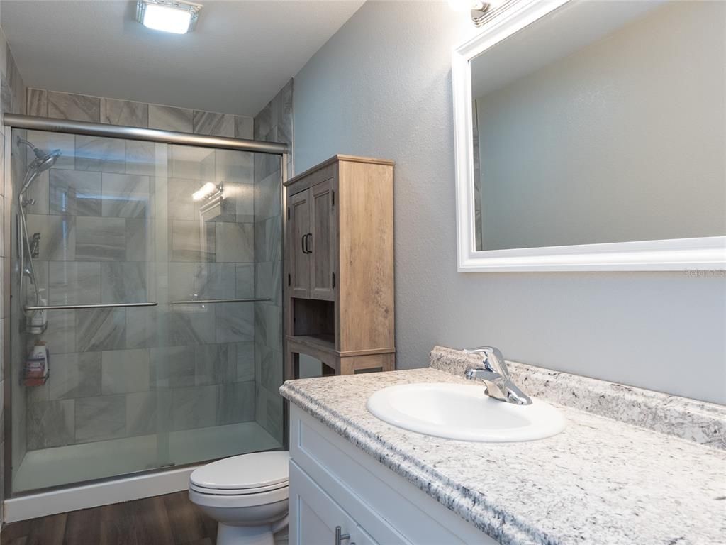 Bathroom, Glass Shower, Interior, Wood Texture Flooring