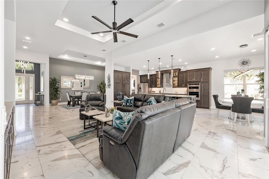 Chandelier, Dining room, Interior, Kitchen, Living room, Marble, Pendant Lights, Recessed Lighting, Stainless Steel Appliances